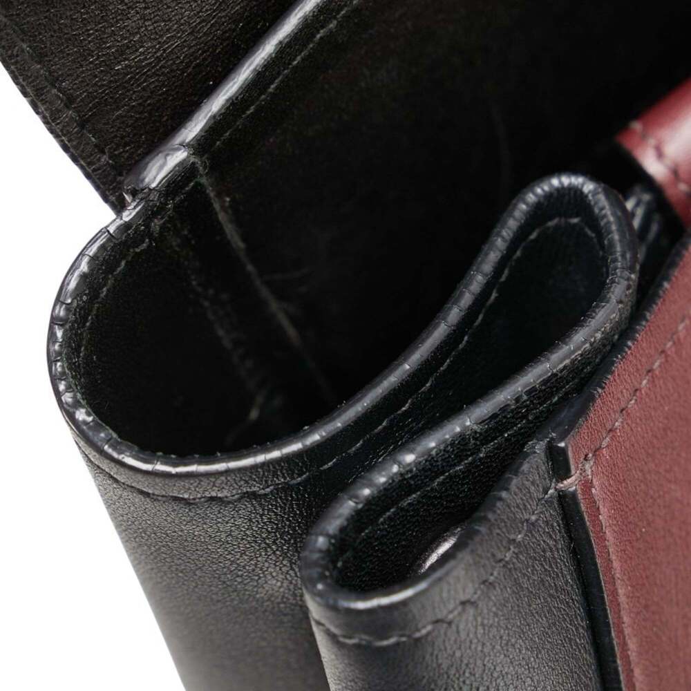 Prada handbag in wine red and black leather for women. - Picture 9 of 15